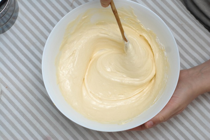 Mixing Baking Dough for Waffles, Egg Yolks and Milk, in a Glass Bowl. Food Preparing Process Photography Concept