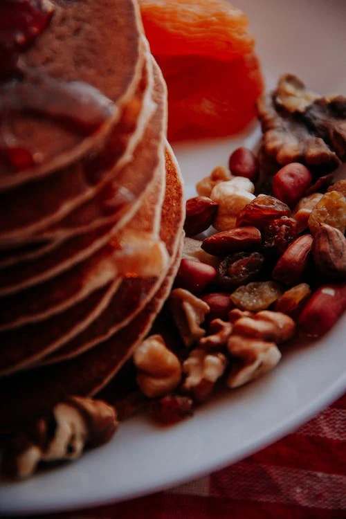 A pile of pancakes and nuts