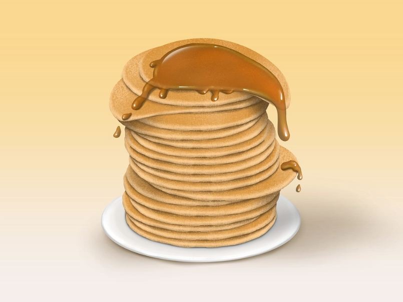 a stack of pancakes with syrup on a plate