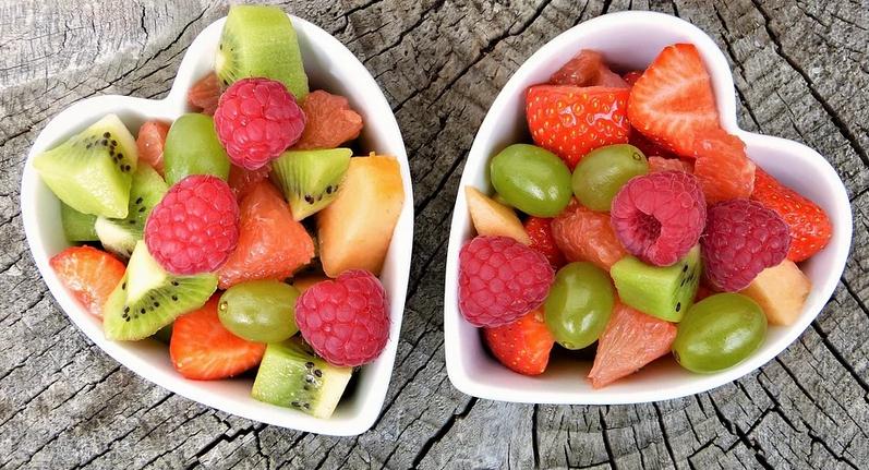 fresh fruits in a bowl, heart-shaped bowl, variety of fresh fruits