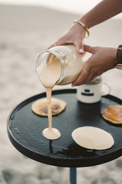 Person cooking pancakes